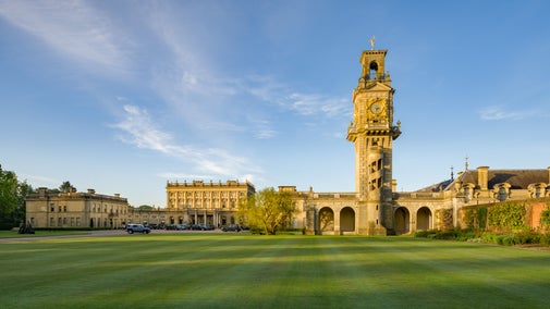 Cliveden House and the Clock Tower on the Right on a sunny day at Cliveden, Buckinghamshire.